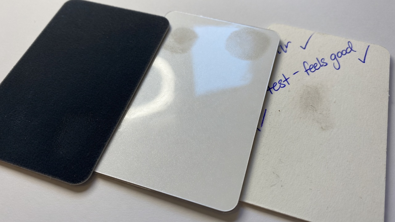 Uncoated card coating compared with film laminates